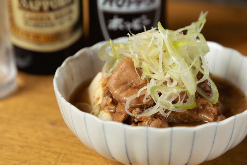 【公式】もつ煮・蒸しつくね たまか食堂